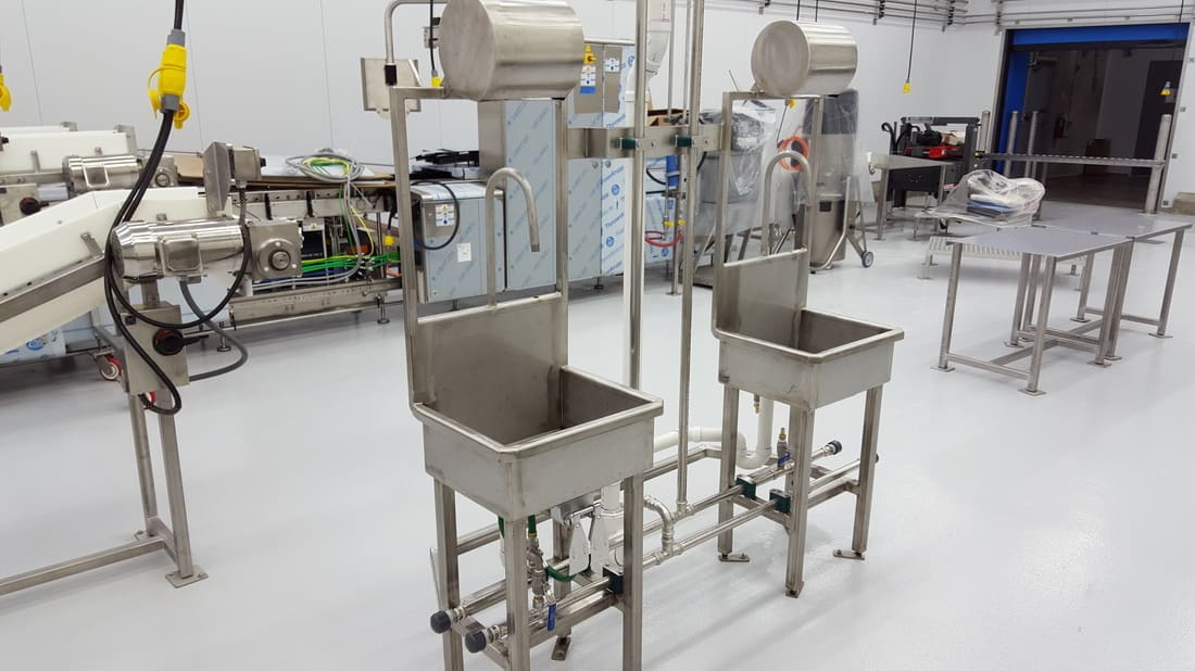 Stainless hand wash sinks fabricated by Metcalf Design